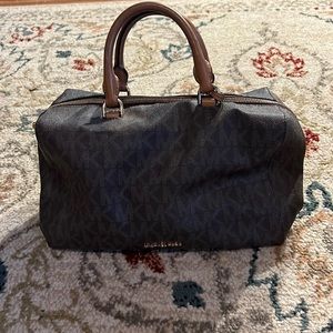 Michael Kors purse. Brown with hand straps.